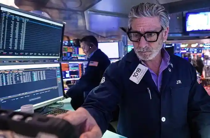 Wall Street pulls near its all-time high